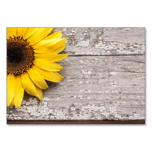 Sonnenblume auf einem Holztisch Tischnummer