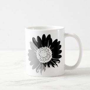 Sonnenblume in grauer Tasse
