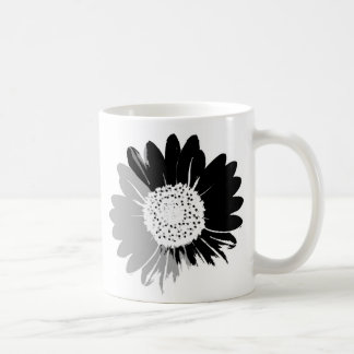 Sonnenblume in grauer Tasse