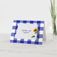 Sonnenblumen am blauen und weißen Büffel karierter