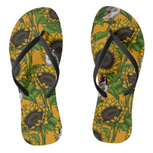 Sonnenblumen und Goldschmuck auf Orange Flip Flops