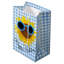 Sonnenbrille auf der Sonnenblumengeschenktasche Mittlere Geschenktüte