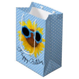 Sonnenbrille auf der Sonnenblumengeschenktasche Mittlere Geschenktüte