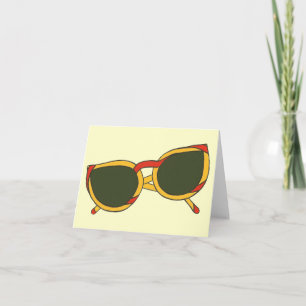Sonnenbrille in gelben und roten Mitteilungskarten