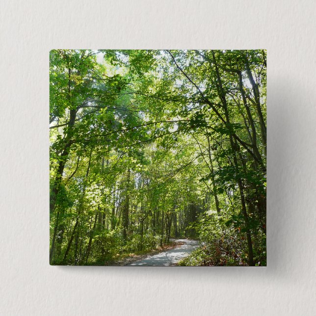 Sonnenlicht auf dem Waldweg im Centennial Park Button (Vorderseite)