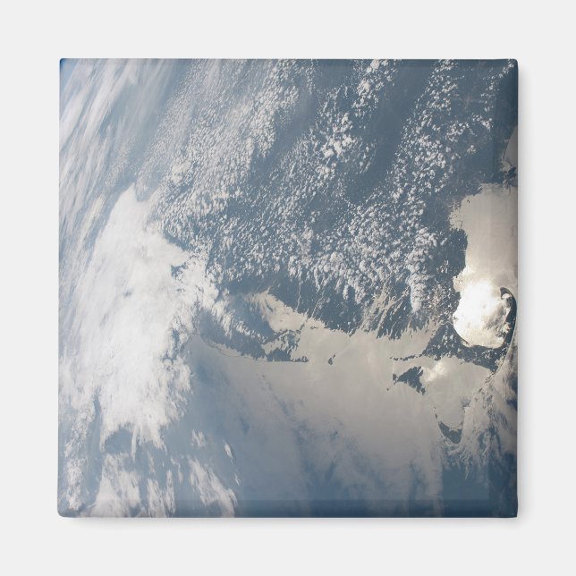 Sonnenschein im Wasser der Erde. Magnet (Vorne)