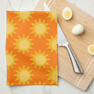 Sonnenschein-Sonnenmuster-Design auf Orange Geschirrtuch