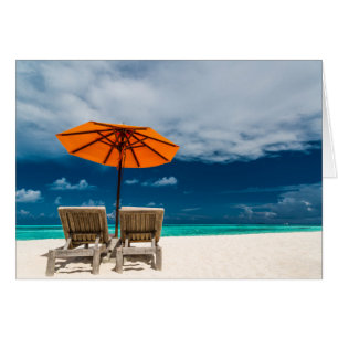 Sonnenschirm am Sandstrand  Malediven
