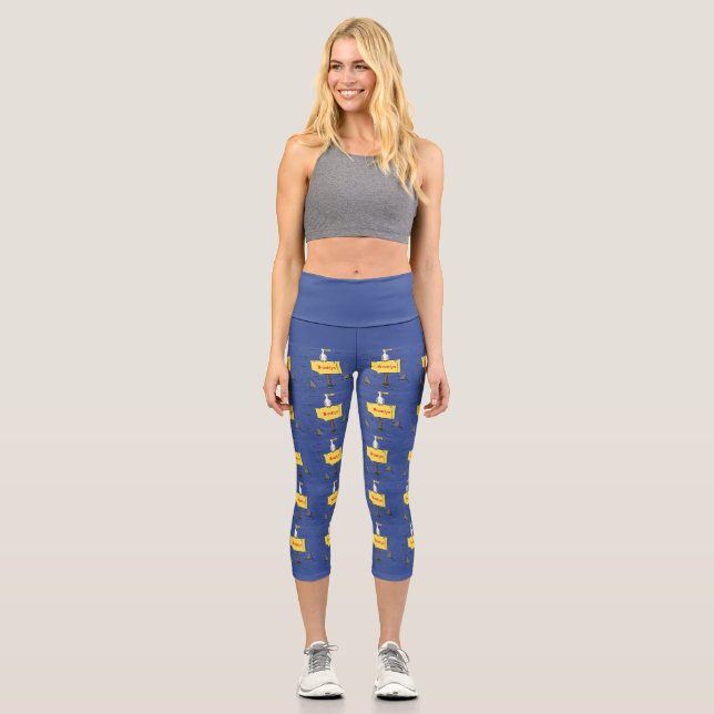 Sonnensevogel umkreist von Haifischen Cartoon Capri Leggings (Vorderseite)