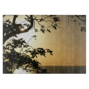 Sonnenuntergang durch die Tropenfotografie der Bäu Schneidebrett