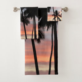 Sonnenuntergang durch tropische Palmen Badhandtuch Set