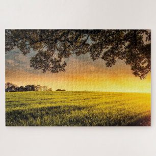 Sonnenuntergang in einem Puzzle der Landschaft auf