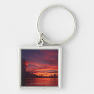 Sonnenuntergang in Meer mit dunklen Wolken Schlüsselanhänger