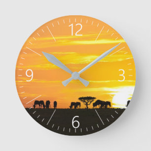 Sonnenuntergang in Serengeti Runde Wanduhr