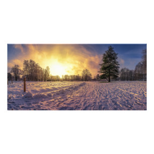 Sonnenuntergang über dem schneebedeckten Winterpar Fotodruck