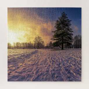 Sonnenuntergang über dem schneebedeckten Winterpar Puzzle