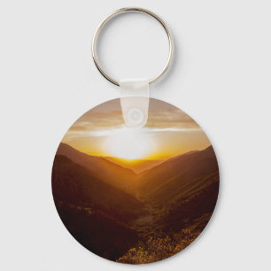 Sonnenuntergang über der Berglandschaft Schlüsselanhänger