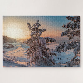 Sonnenuntergang über der schneebedeckten Küste Puzzle