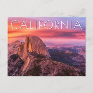 Sonnenuntergang über einer felsigen Landschaft Postkarte