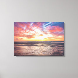 Sonnenuntergang über Strand und Meer Leinwanddruck