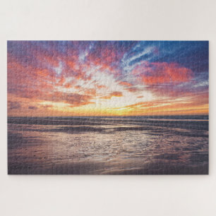 Sonnenuntergang über Strand und Meer Puzzle