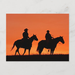 Sonnenuntergangs-Cowboy-Fahrt-Design Postkarte