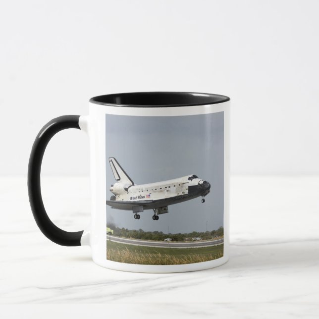 Space Shuttle Discovery geht Landung 3 an Tasse (Links)