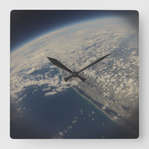 Space time! Beautiful Picture of Florida's coast Quadratische Wanduhr
