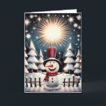 Sparkling Snowman Joy Feiertagskarte<br><div class="desc">Unser fröhlicher Schneemann steht mit offenen Armen in einem schneebedeckten Wald unter einem funkelnden Sternenhimmel. Er begrüßt den Zauber der Saison. Dressing in seinem festlichen roten Top Hut und gestreift, warm gemütlichen Schal. Er strahlt hell, umgeben von mattierten Bäumen und kleinen Hütten. Diese herzzerwärmende Szene ist voll von Winterwunder. Das...</div>