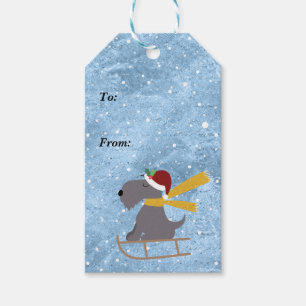 Spaß-Weihnachtshund, der zu von Sledding ist Geschenkanhänger