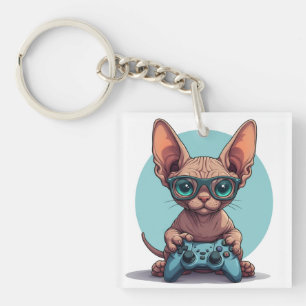 Sphynx-Katze hält Spielcontroller Schlüsselanhänger