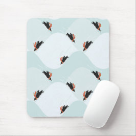 Spielerische Pinguine, die auf dem Schneepattern g Mousepad