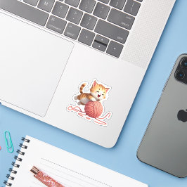 Spielerisches Kätzchen mit Die Sticker aus rosa Ga