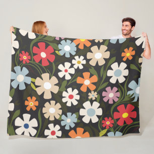 Spielerisches Multicolor-Blumengesteck mit schwarz Fleecedecke