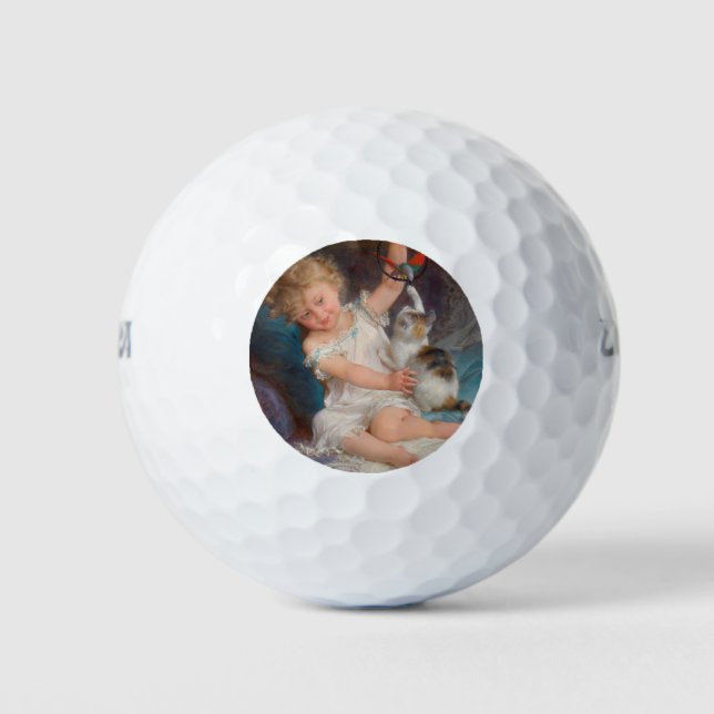 Spielzeit: Mädchen spielen mit ihrem Pet Kitten Golfball (Vorderseite)