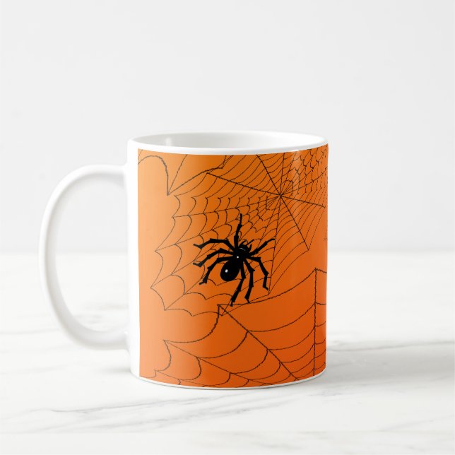 Spinnennetz auf Orange Tasse (Links)