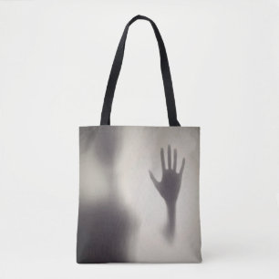 Spitzige Hand auf der Glasplatte Halloween Totbeut