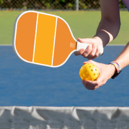 Sporen goldgelbe, weiße Streifen auf feinem Orange Pickleball Schläger