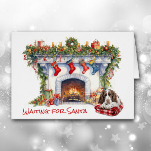 Springer Spaniel Hund warten auf Santa Fireplace