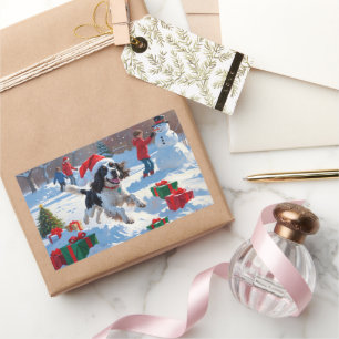 Springer Spaniel läuft durch Schnee mit Weihnachts Rechteckiger Aufkleber