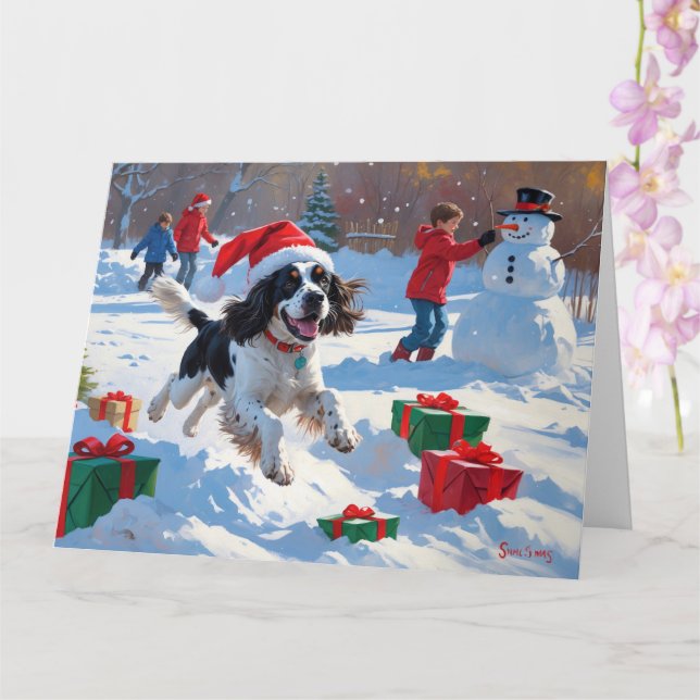 Springer Spaniel Running Snow mit Weihnachtshut Karte (Orchidee)
