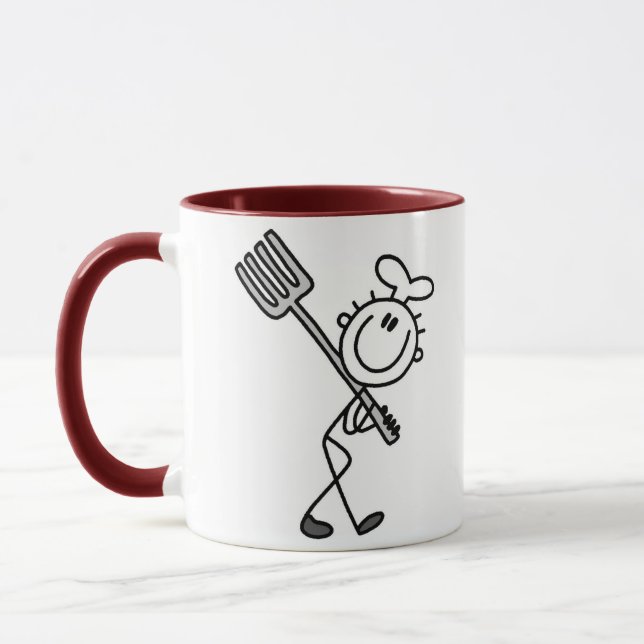 Stäbchenfigur-Koch mit Gabel Tasse (Links)