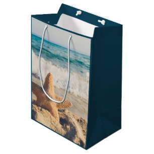 Starfish auf einem Sandy Beach Foto Mittlere Geschenktüte