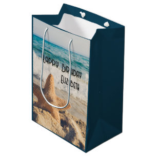 Starfish auf einem Sandy Beach Foto Mittlere Geschenktüte
