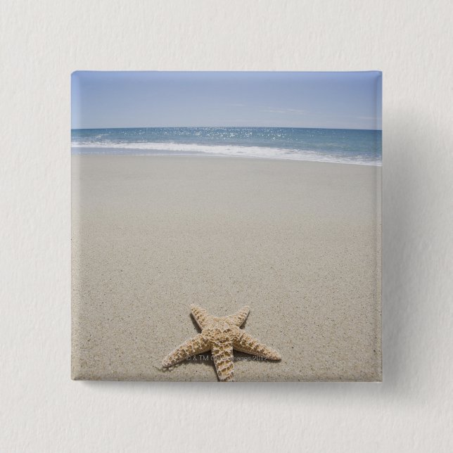 Starfish auf Strand durch Atlantik Button (Vorderseite)
