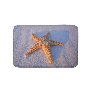 Starfish auf weißem Sand Badematte