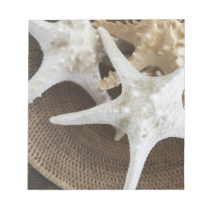 Starfish in einem Korb Notizblock
