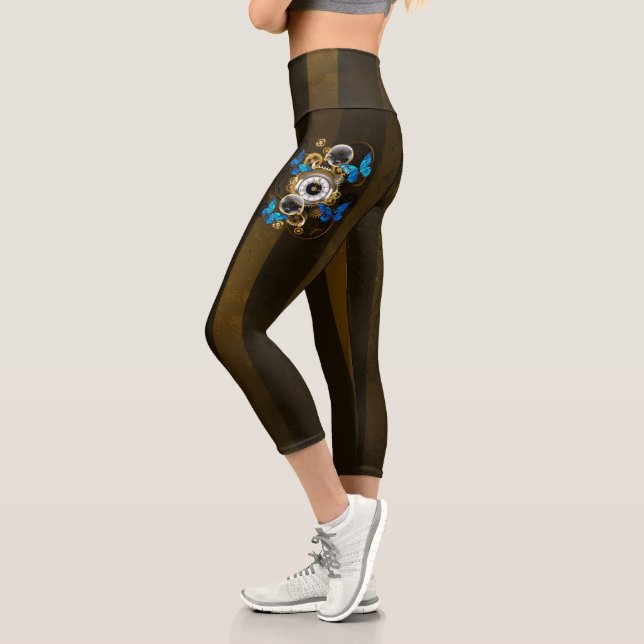 Steampunkgeere und blaue Schmetterlinge Capri Leggings (Links)