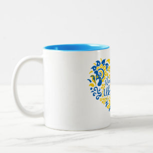 Stehen Sie mit ukrainischer Schrift und Herz Zweifarbige Tasse