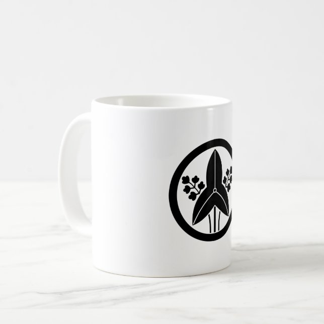 Stehende Pfeilspitze in einem Kreis Kaffeetasse (Vorderseite Links)